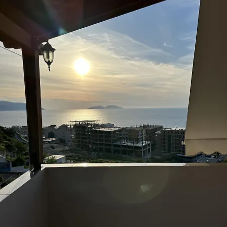 Sea Sunset & Sazani Island View